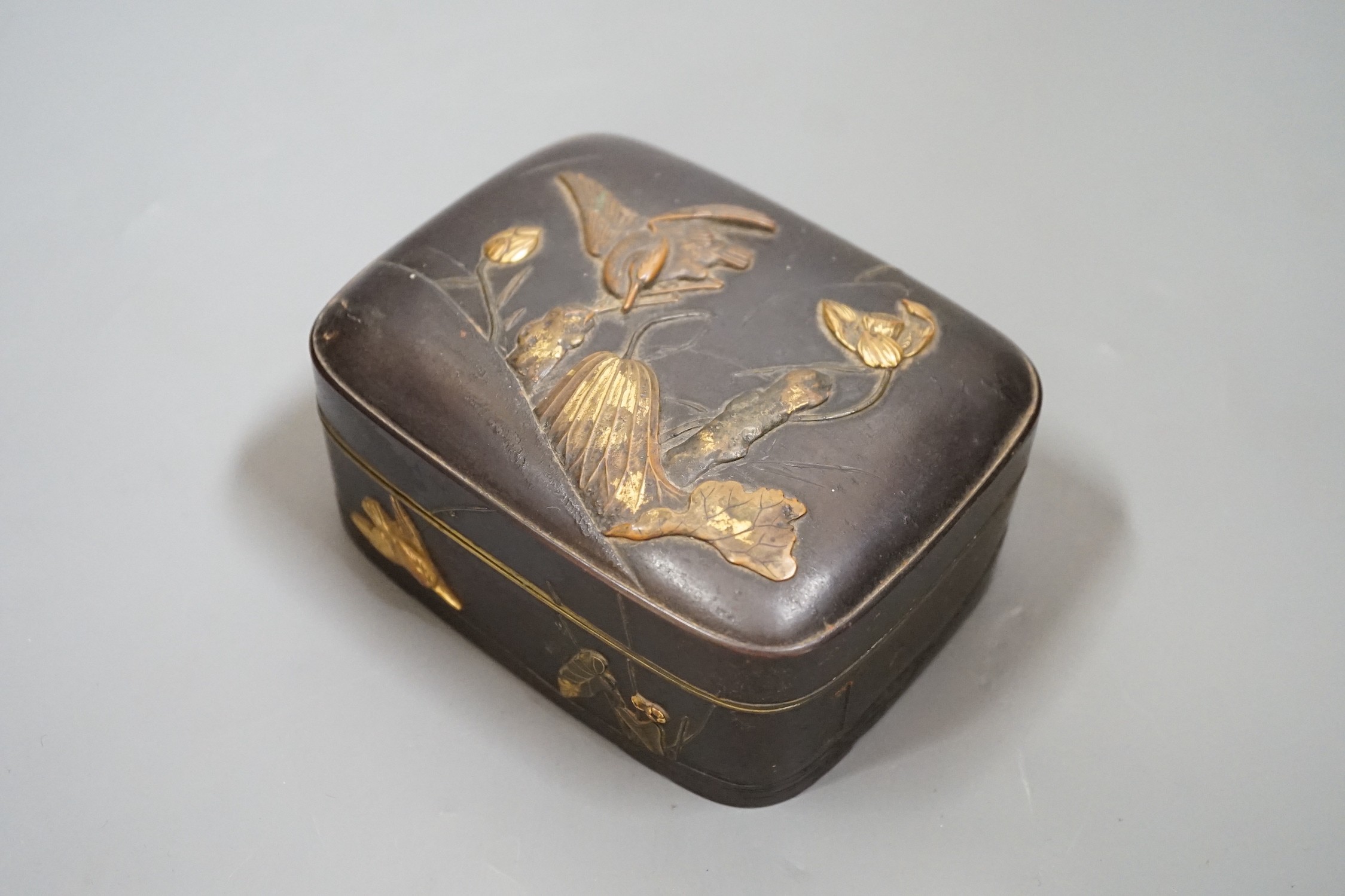 A Japanese bronze and mixed metal box, Meiji period, 12cm wide 9.5cm deep